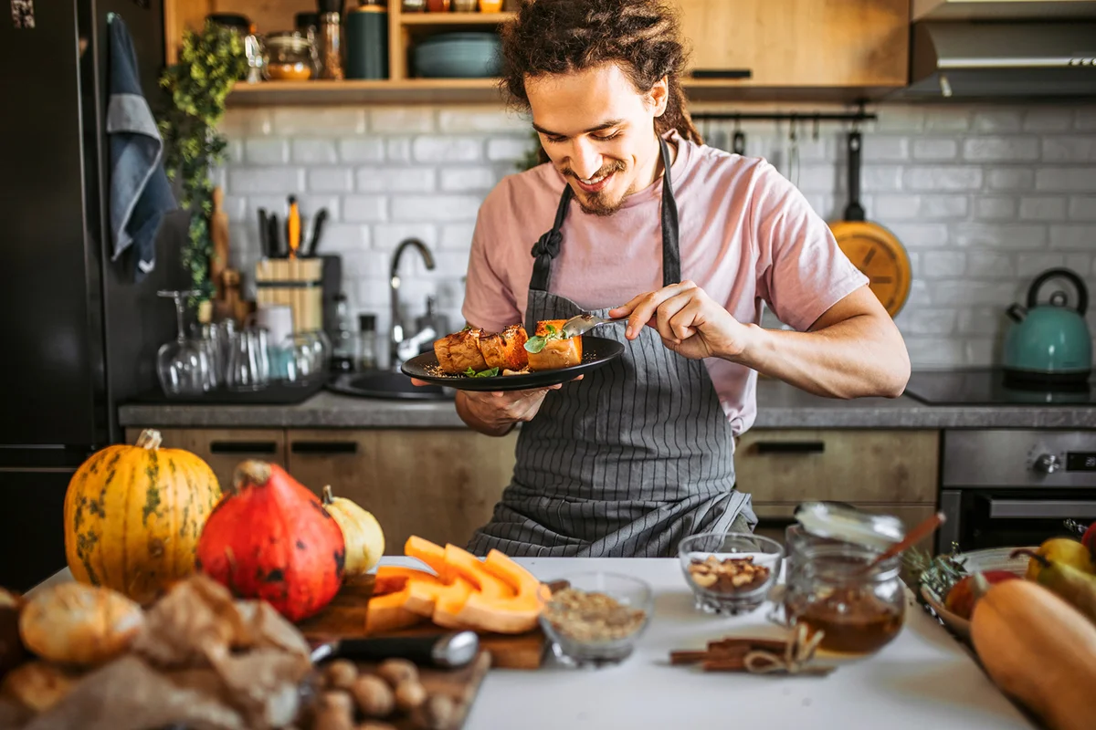 Young man eating delicious and healthy dessert