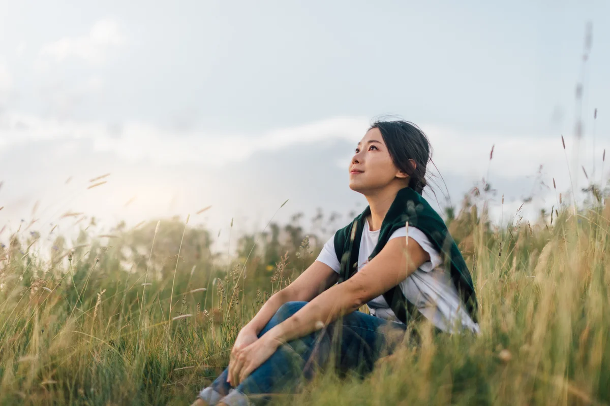woman being mindful in nature