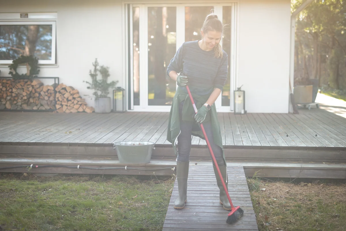 Woman cleaning deck