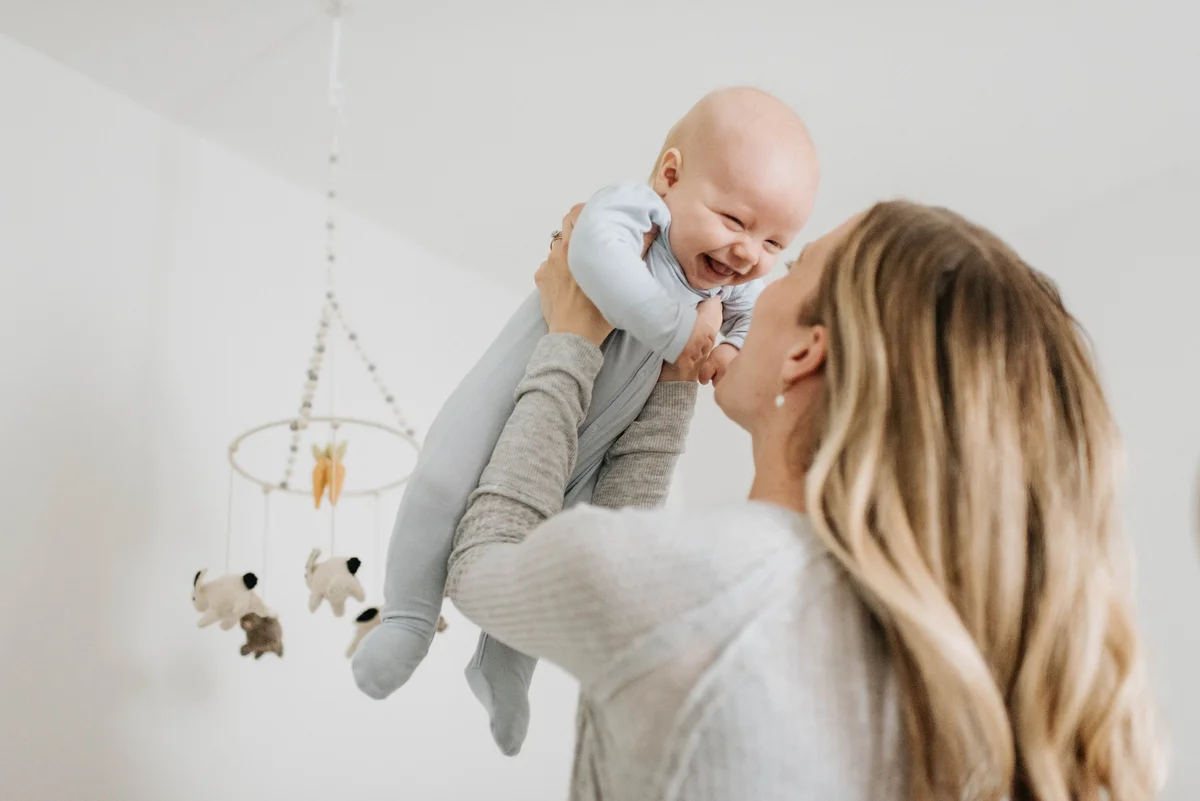 Mom and baby playing