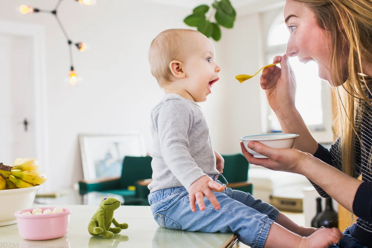 Baby trying new food