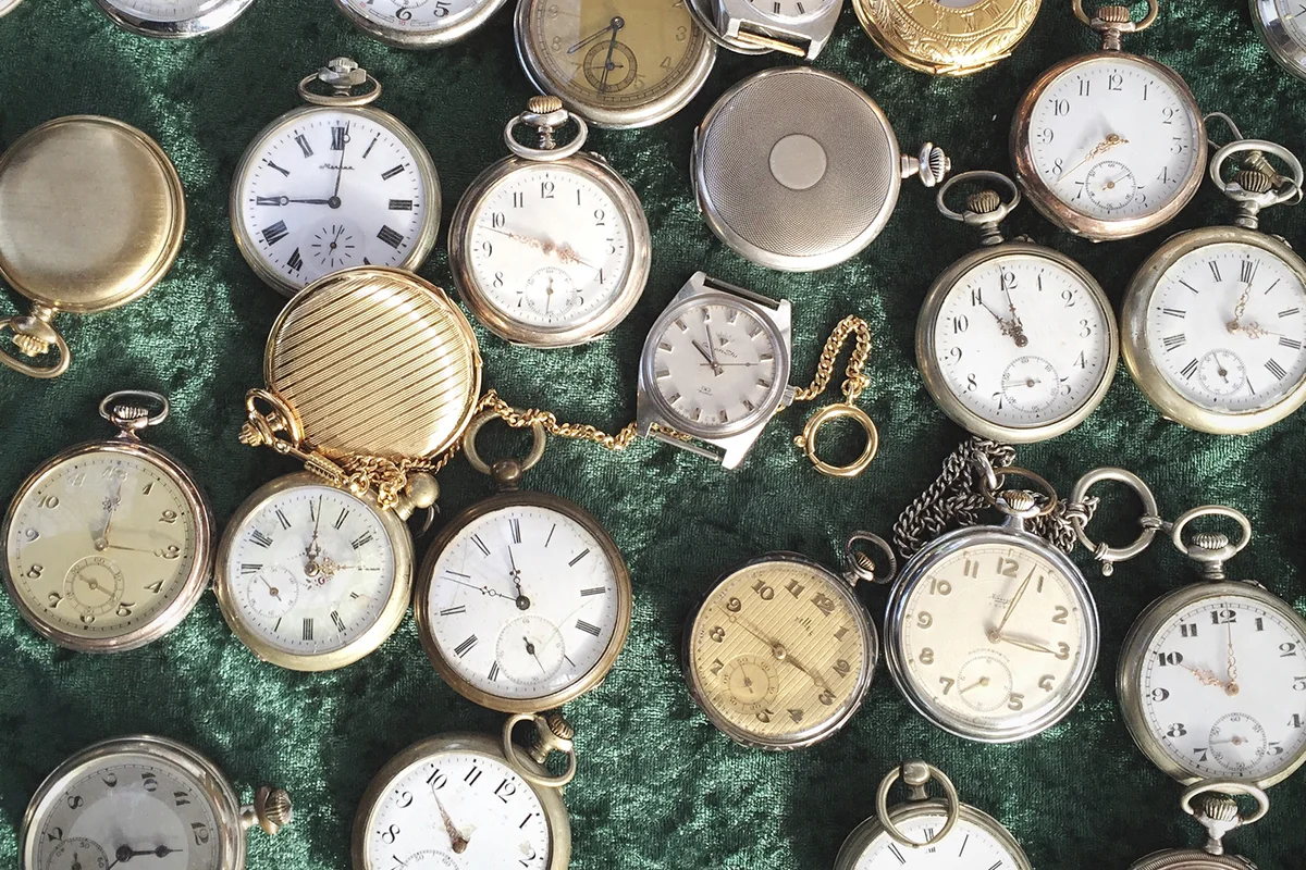 Directly Above Of Old Fashioned Pocket Watches In Shop