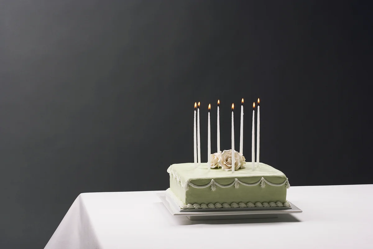 Vintage birthday cake with candles