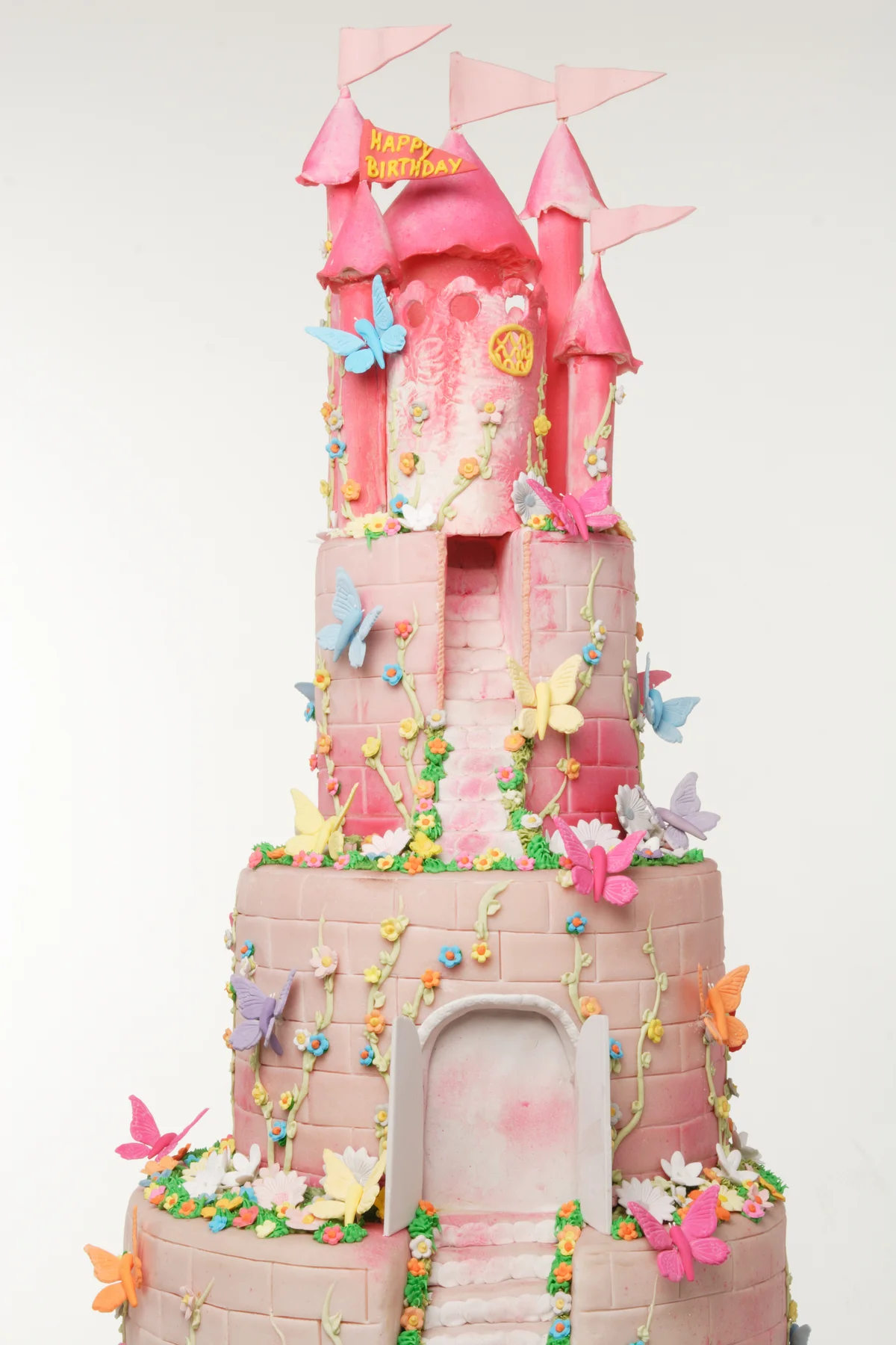Pink castle cake like Rapunzel's tower