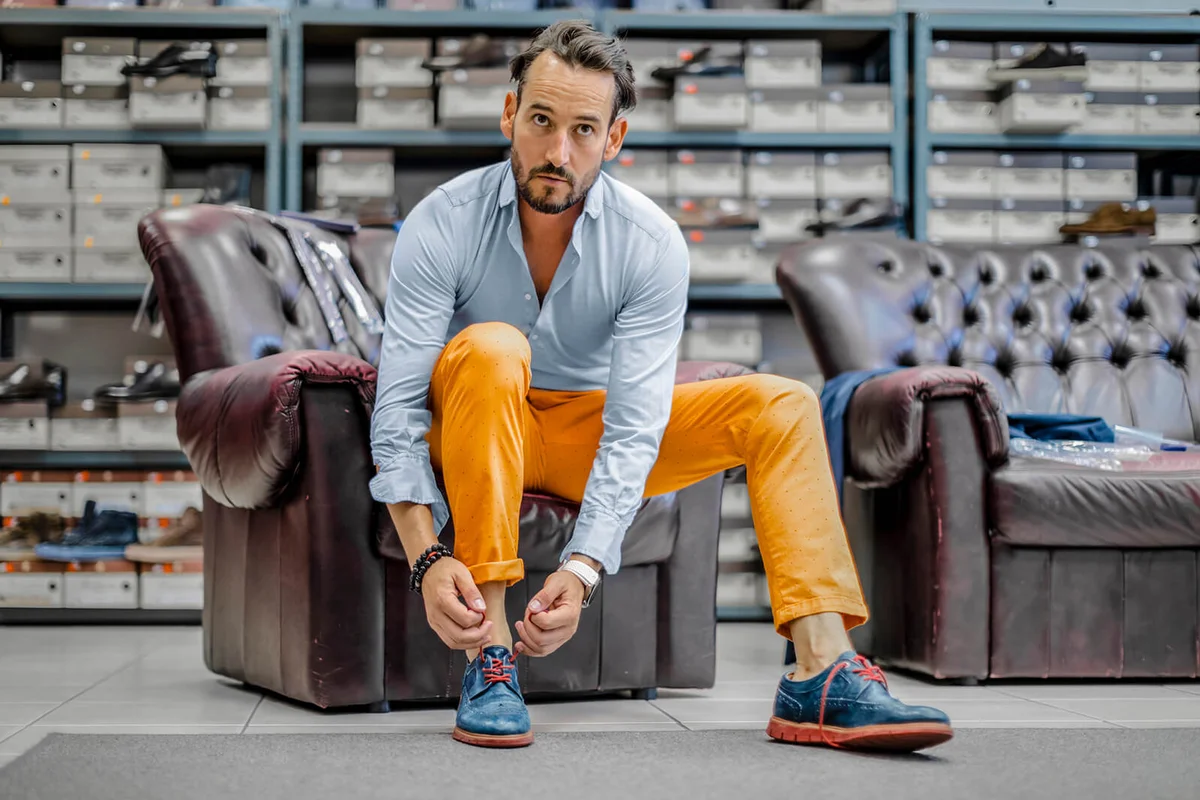 Young man shopping shoes