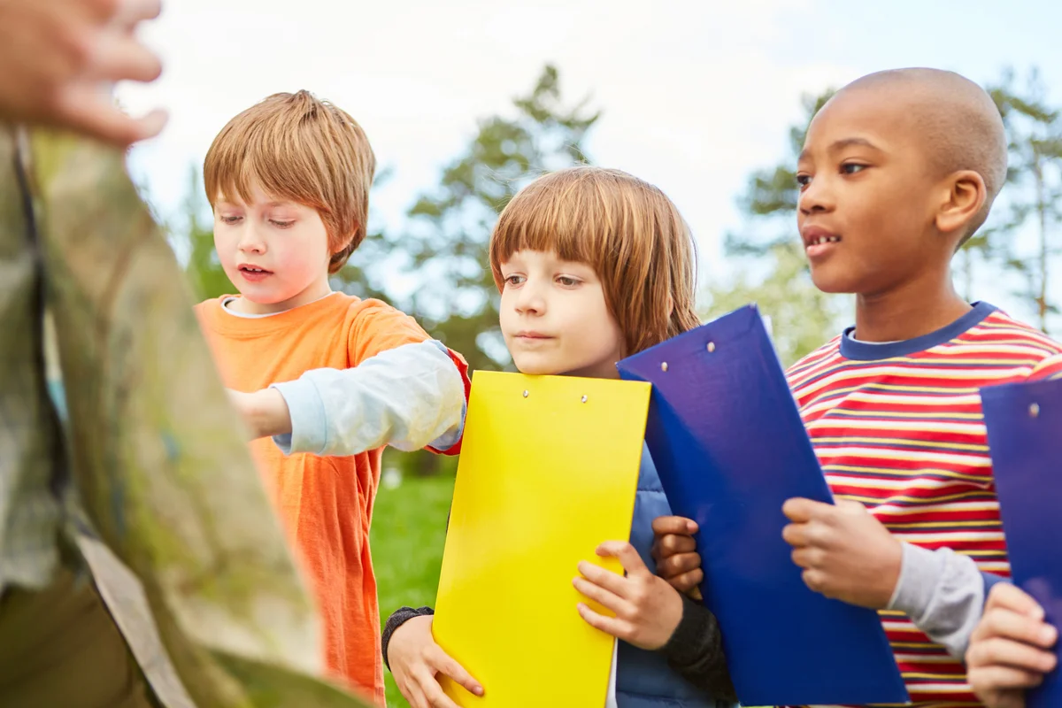 kids with clipboards