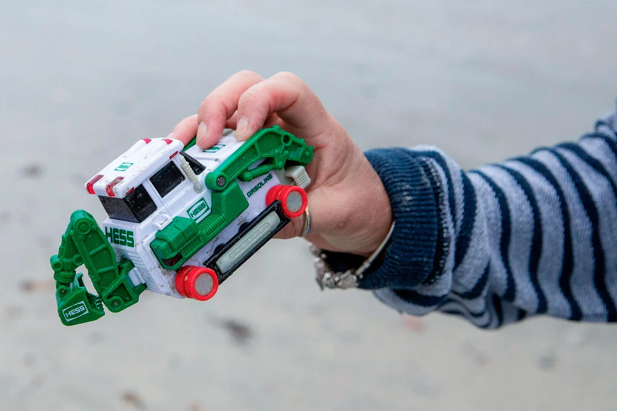 Ginger Wheeler holds up a toy truck