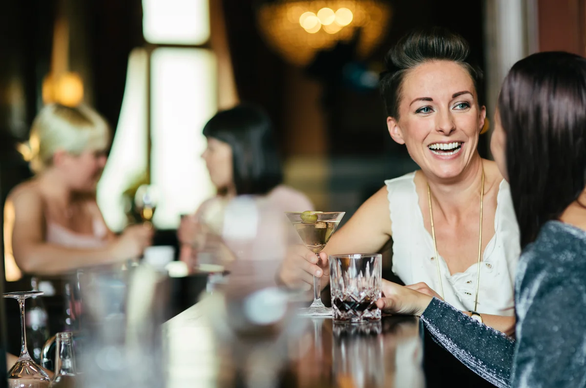 women at a bar
