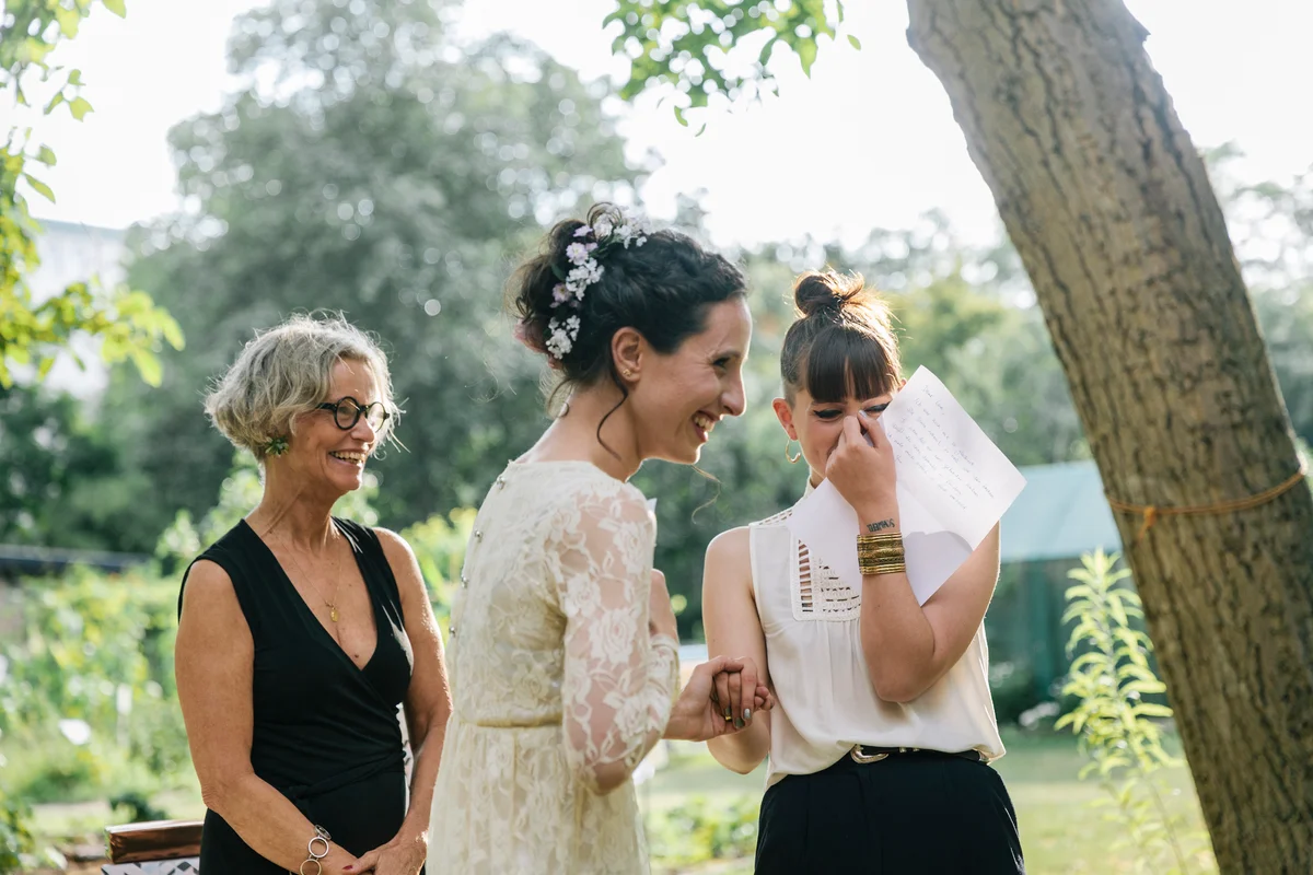 couple laughing at altar