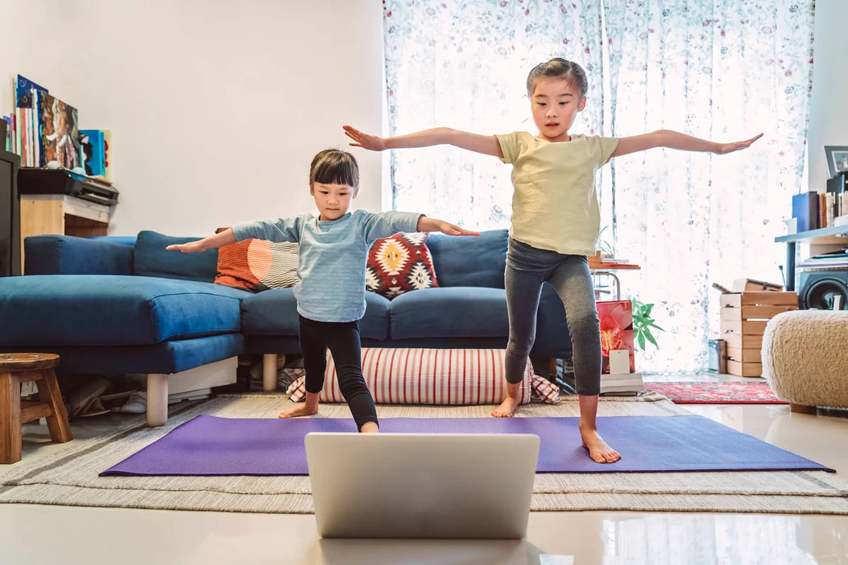 Little sibling enjoy online yoga class