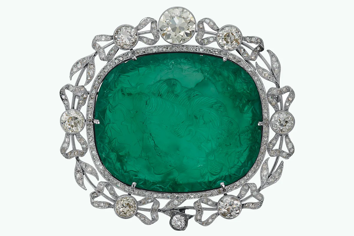 ANTIQUE EMERALD CAMEO AND DIAMOND BROOCH
