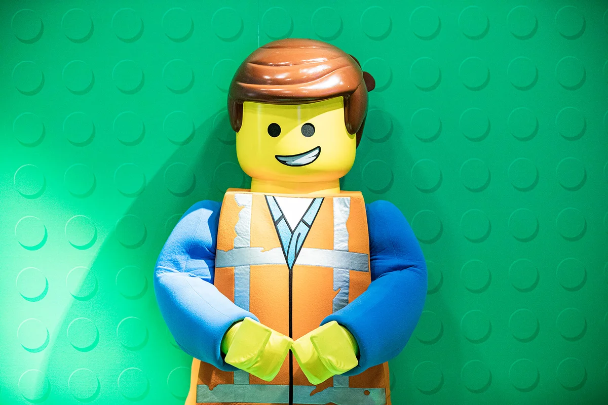 LEGO character Emmet poses at the Grand Opening of The Lego Movie World
