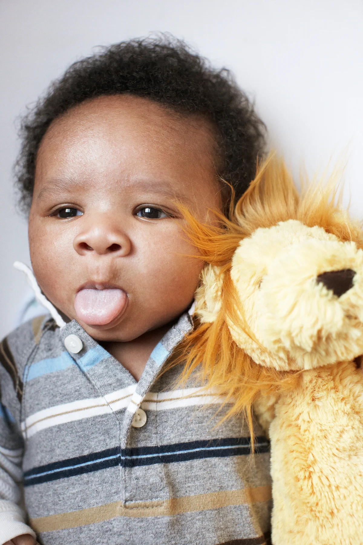 baby sticking out tongue