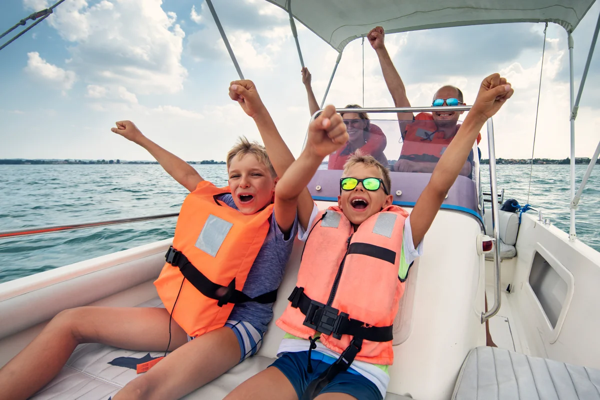 Family enjoying riding a boat