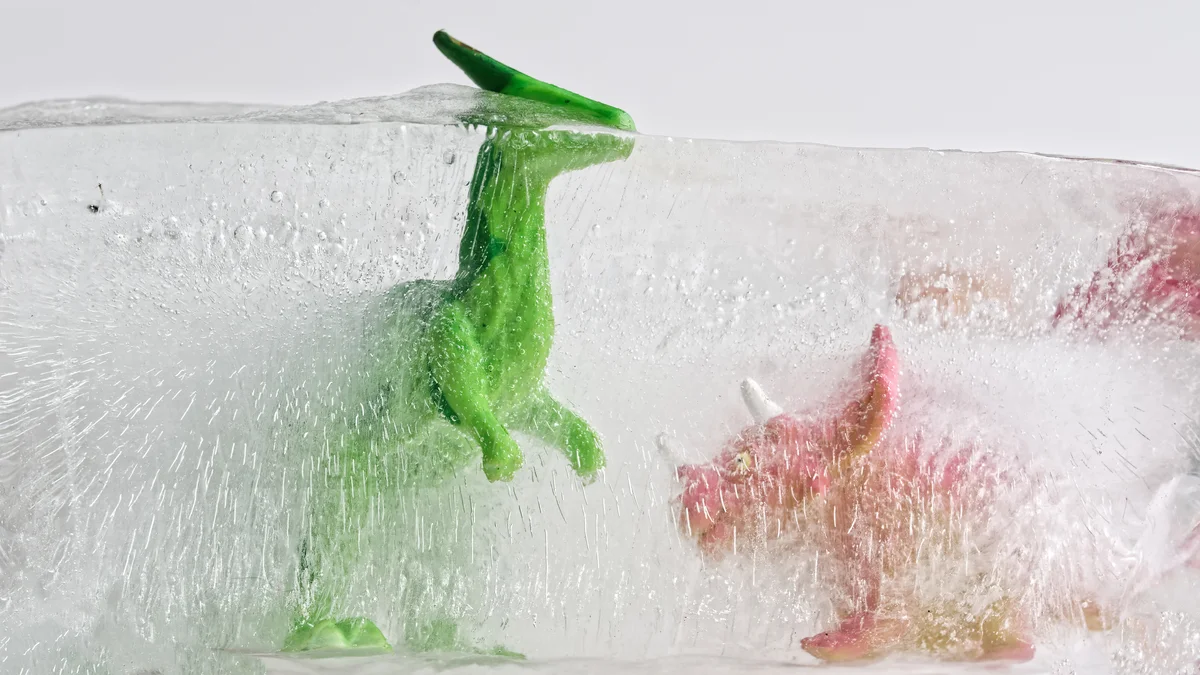 dinosaur toys in ice