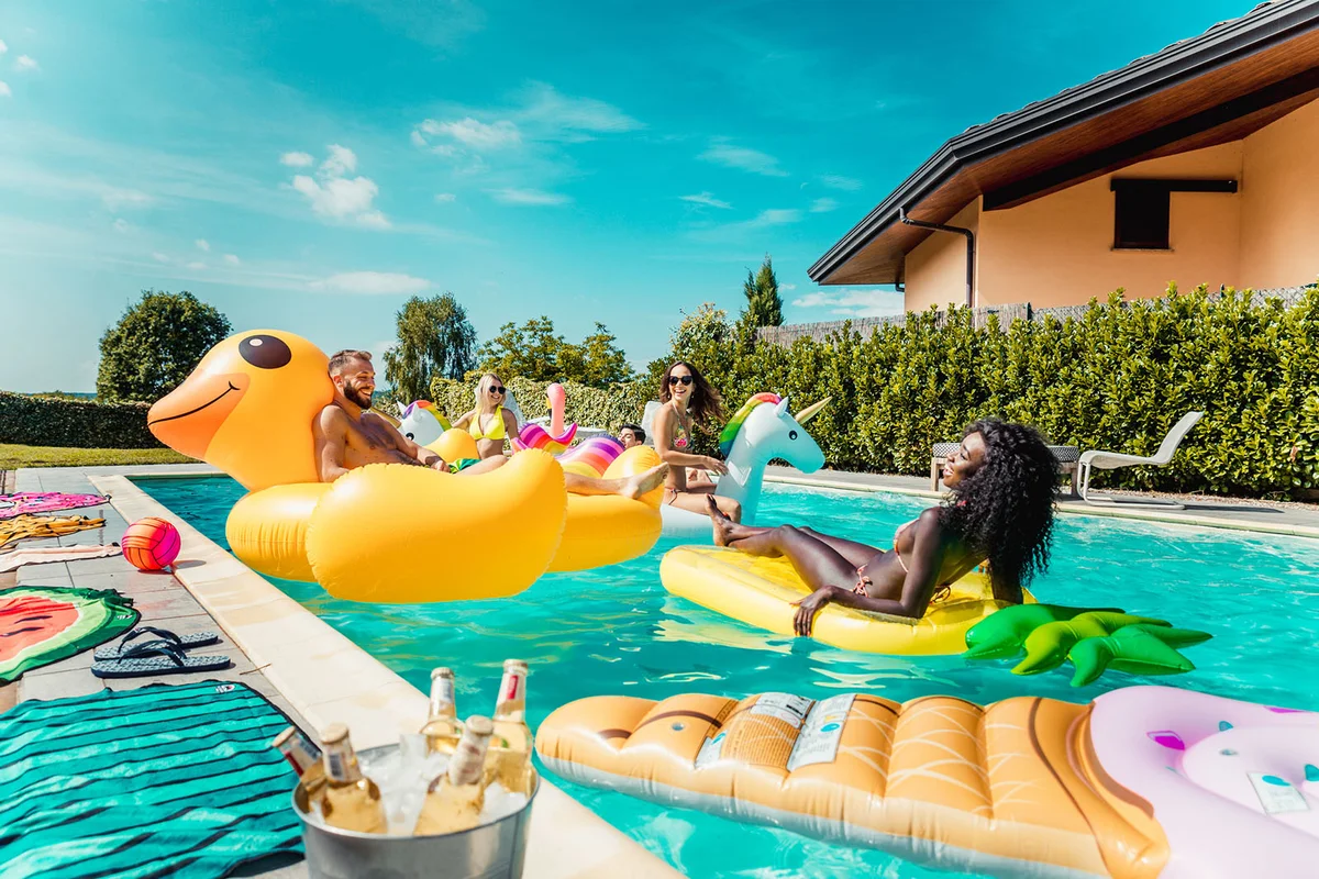 Friends having fun in a swimming pool