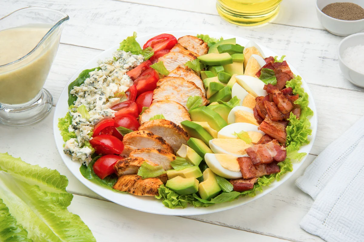 Cobb salad in a white salad bowl