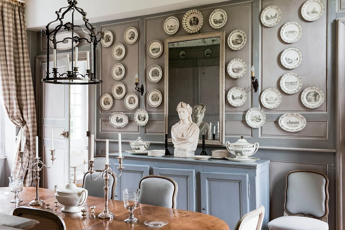 French antique chairs and table in elegant dining room