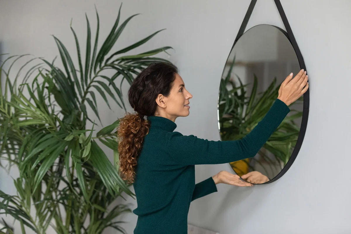 woman decorate own home moving in