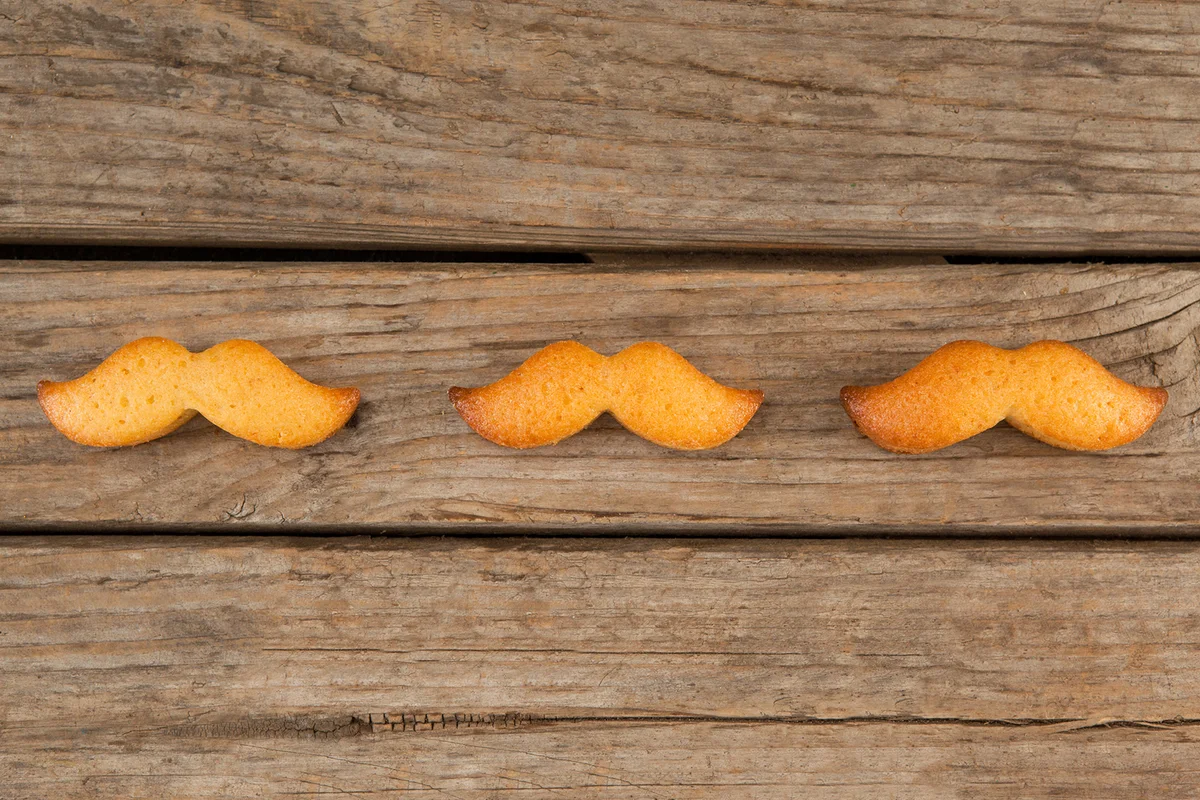 Mustache shape cookies on table