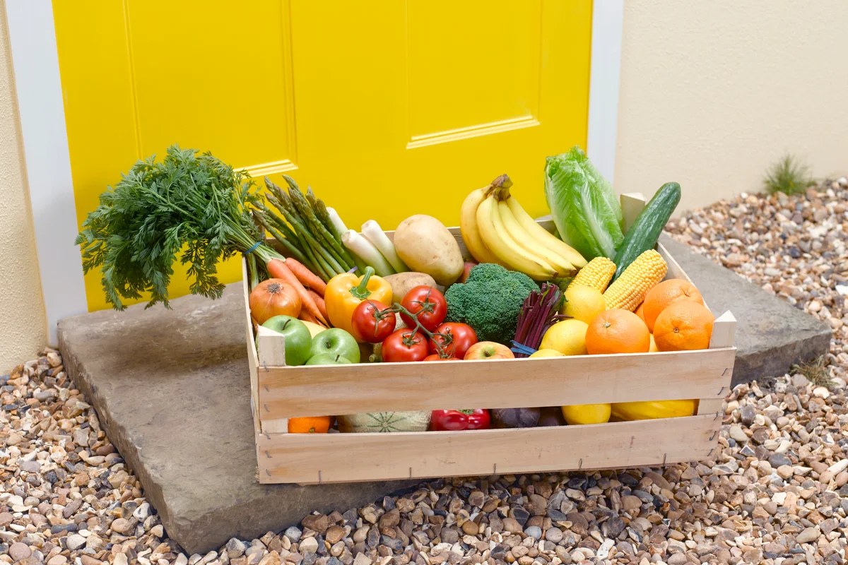Fruit and vegetable delivery on a front doorstep