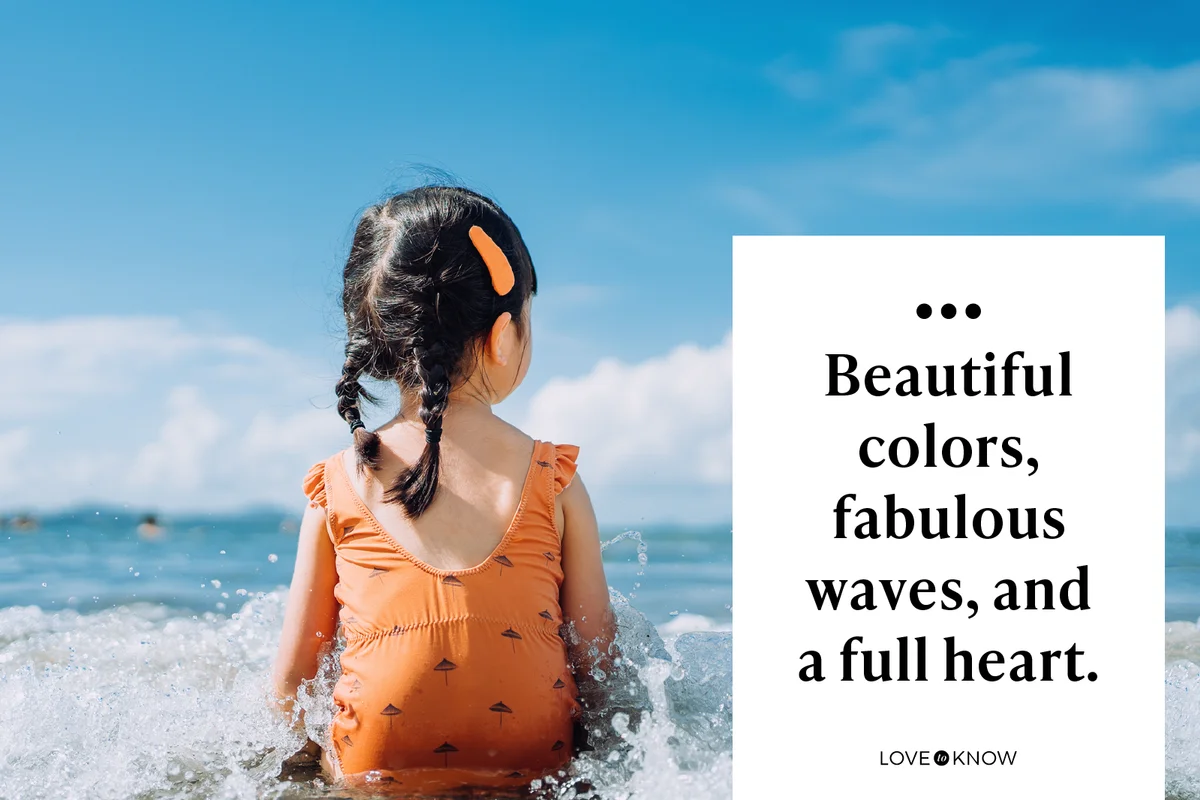 girl sitting by the seashore at the beach