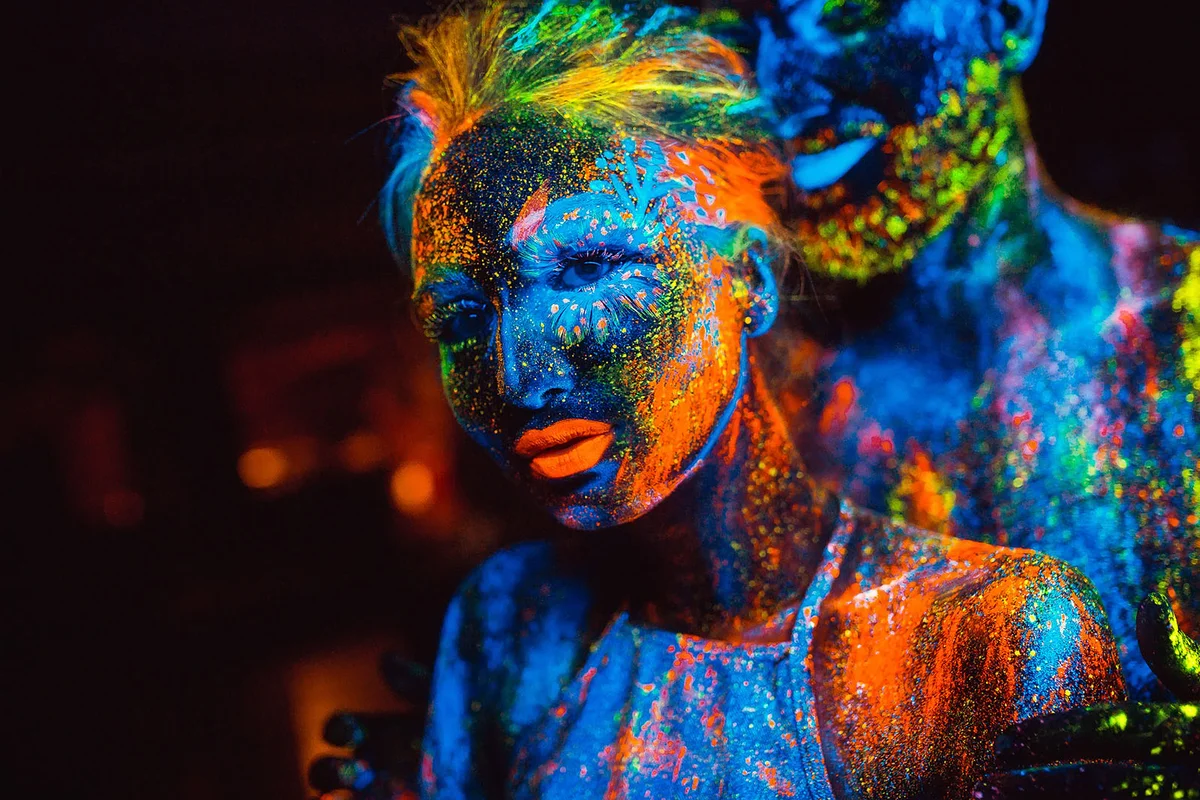 pair of lovers painted in fluorescent powder
