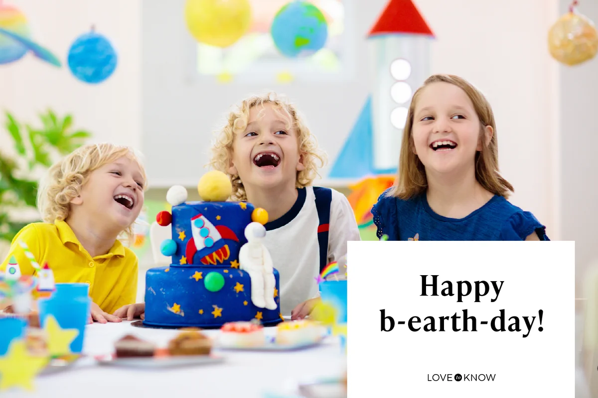 Kids space theme birthday party with cake