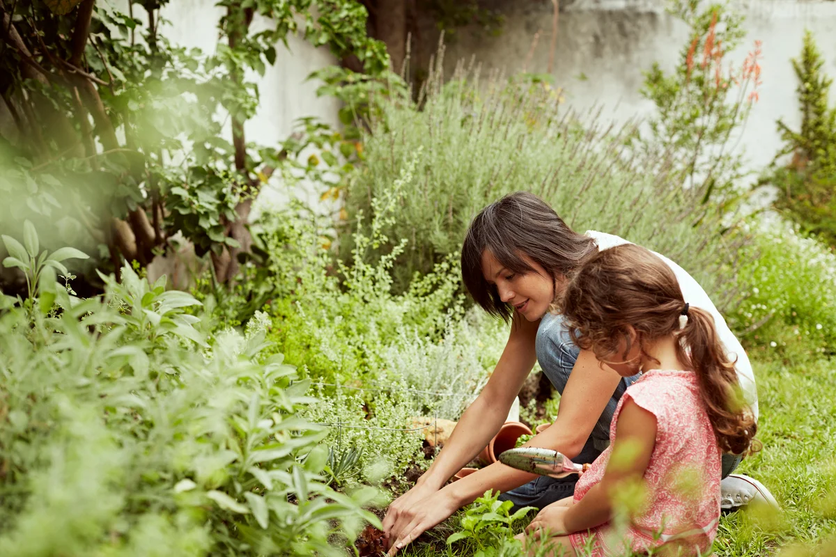 mother and daughter in garden