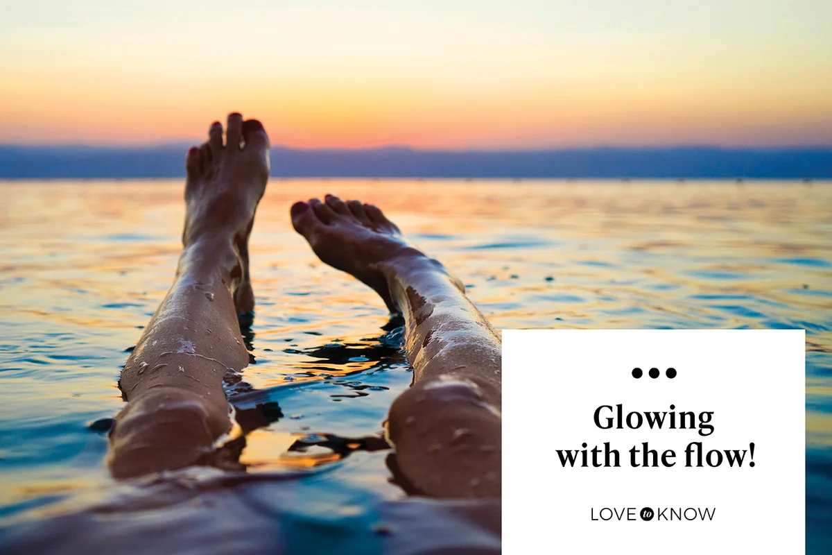 Feet of woman floating in the sea
