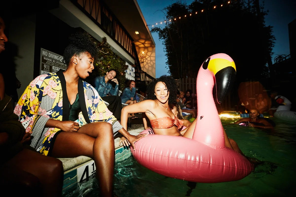 adults at a pool party