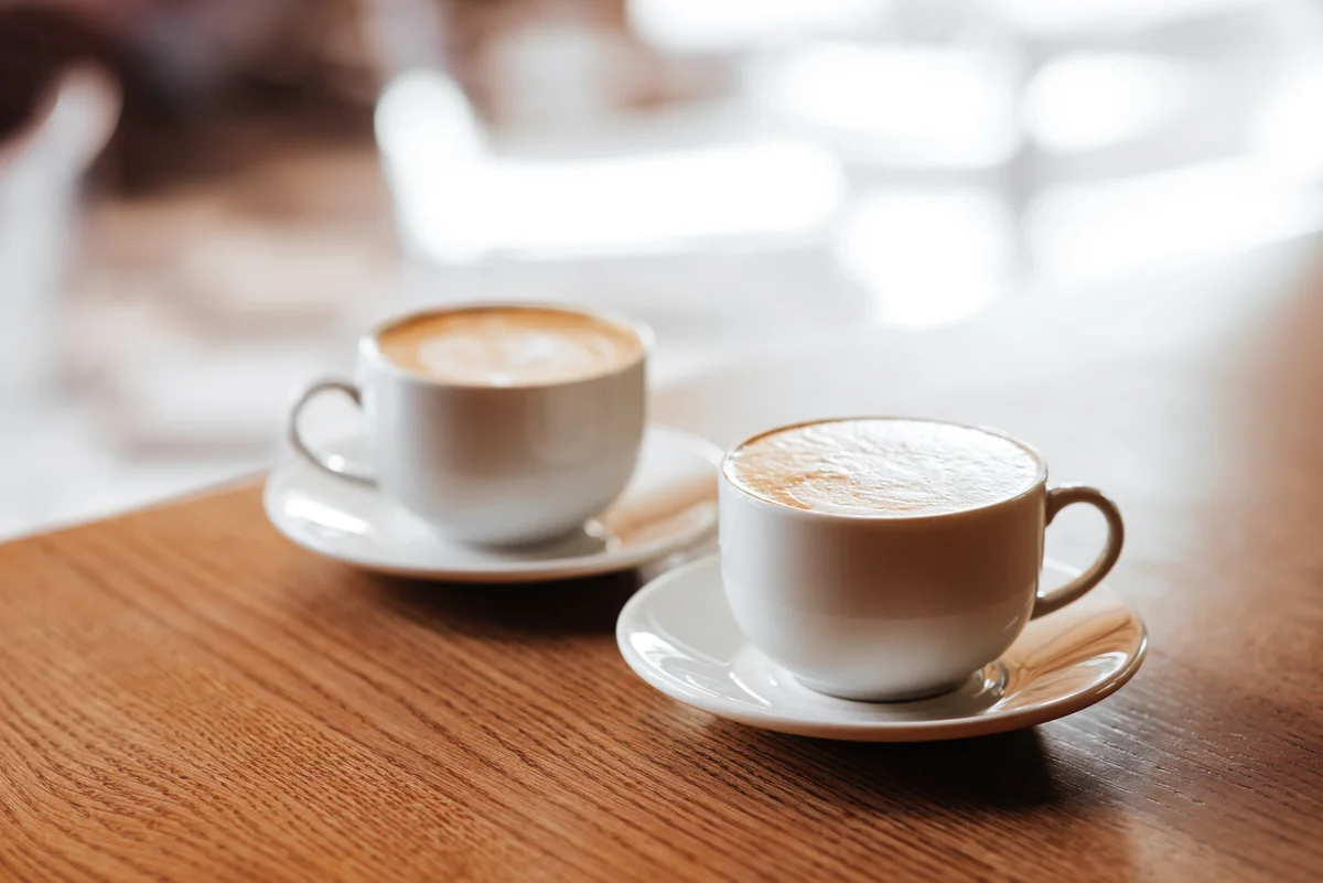 two cups of cappuccino