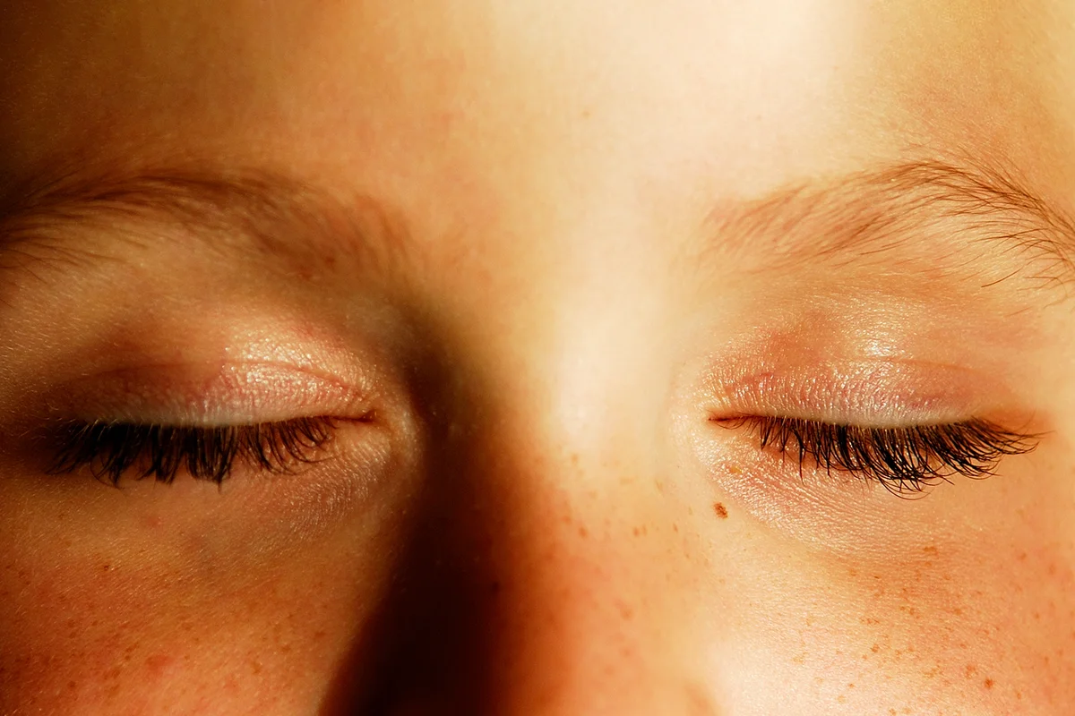 Person with eyes closed