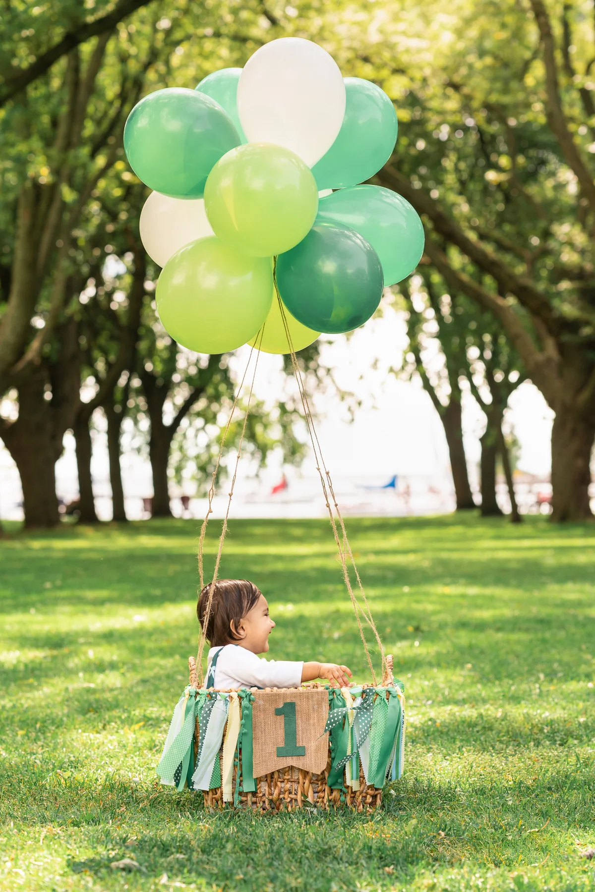 one-year-old in a cute helium "hot air balloon"