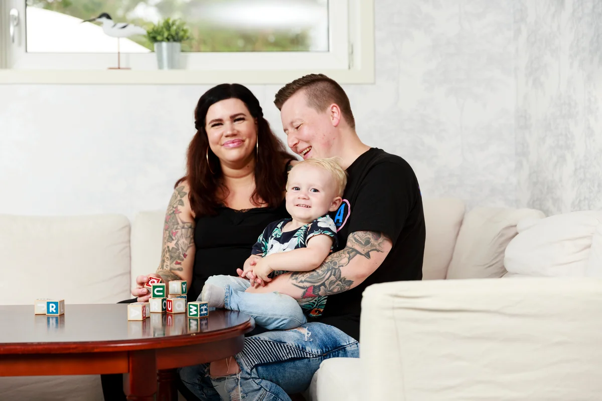 baby with blocks and parents