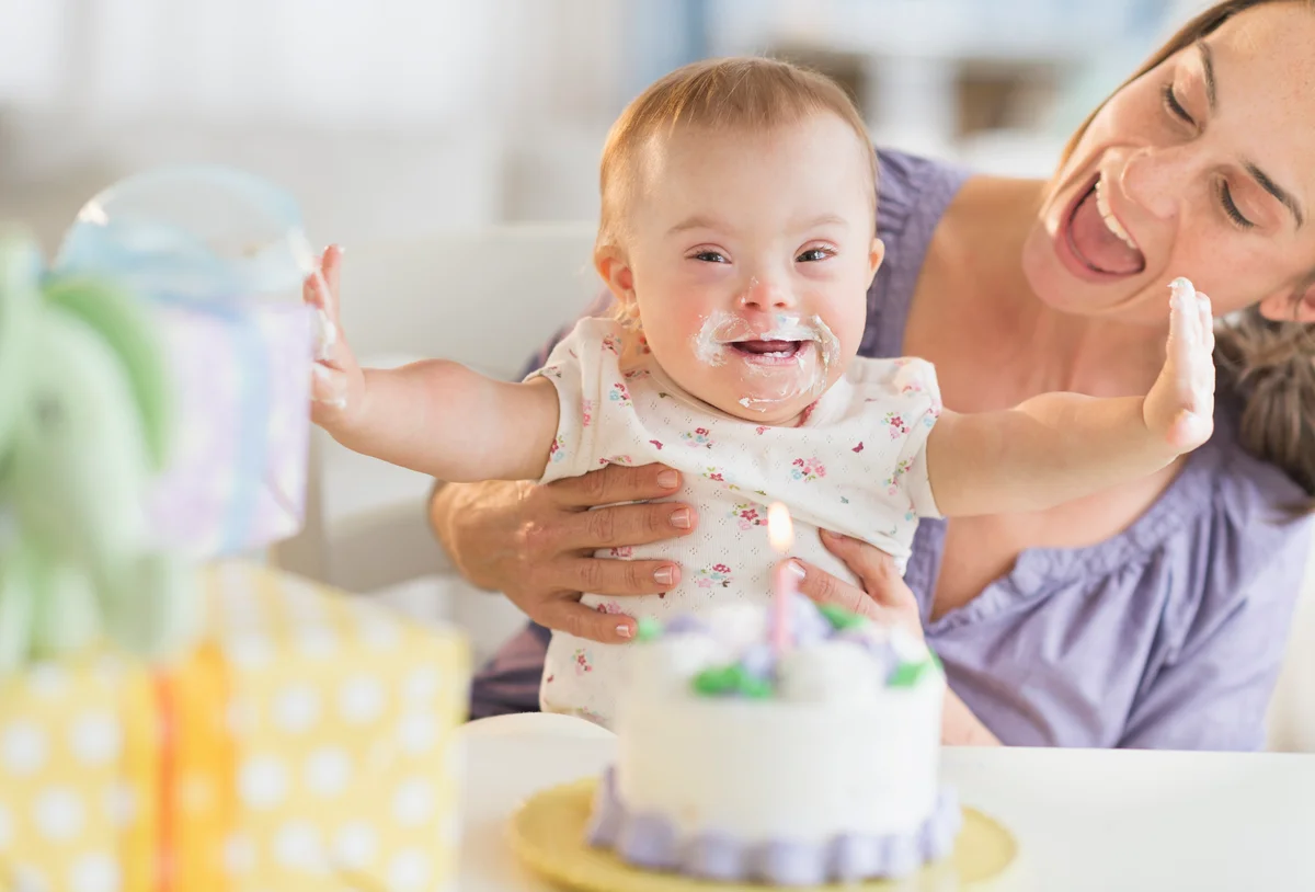 happy mom and baby on birthday