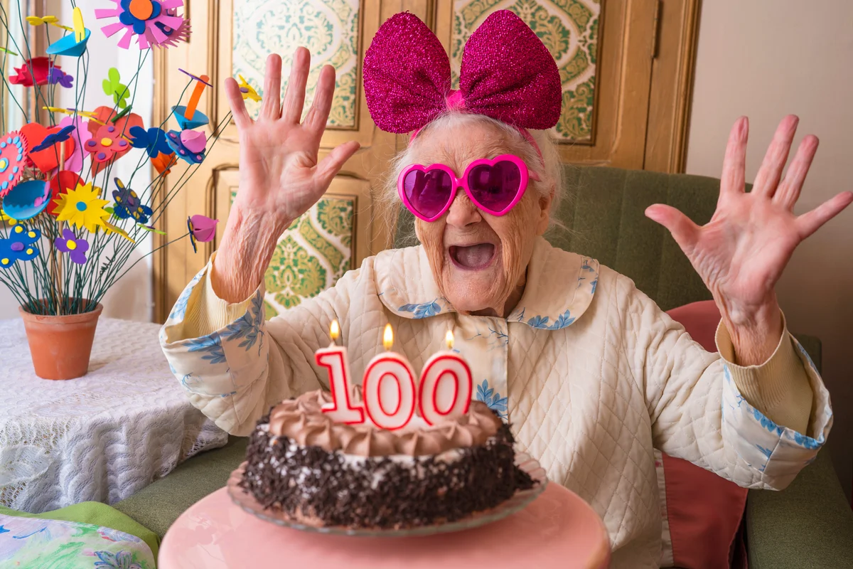 100-year-old woman with cake