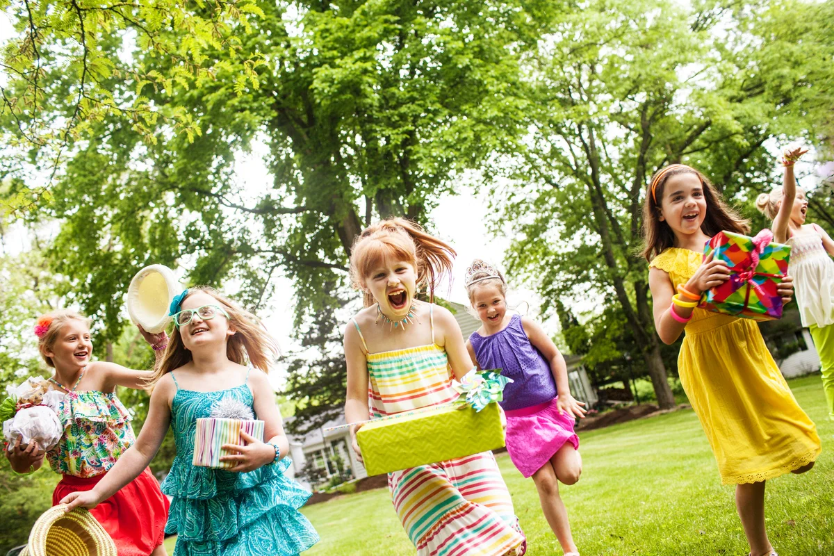 girls at a birthday party running