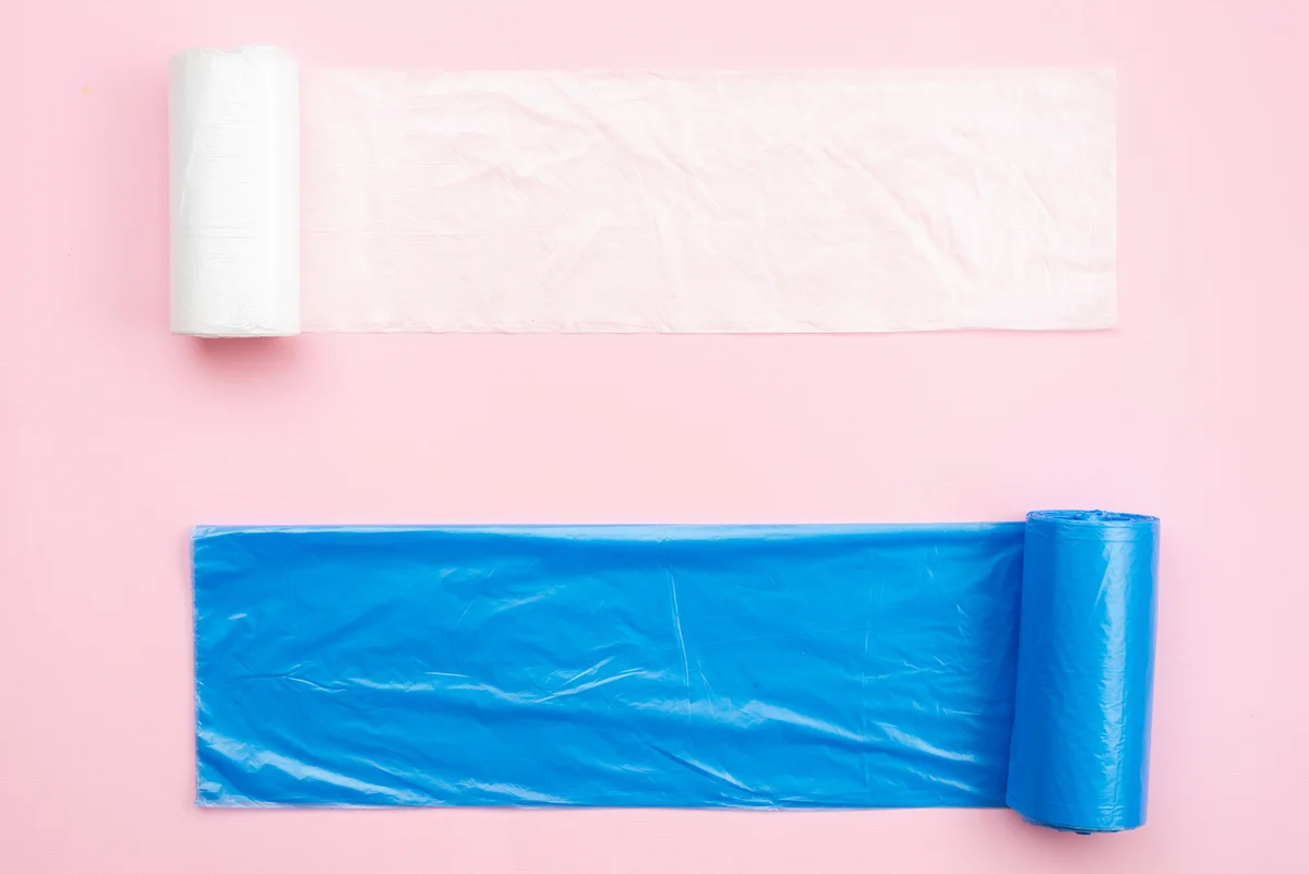 trash bags on pink background