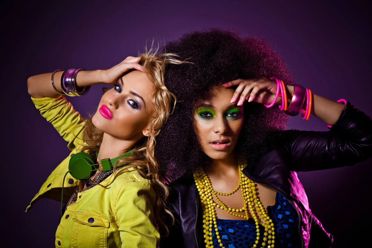 two women dressed in 80s clothes