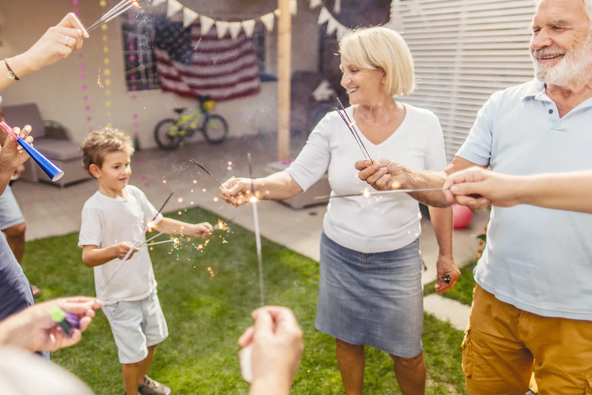 Multigenerational family celebrating Fourth of July