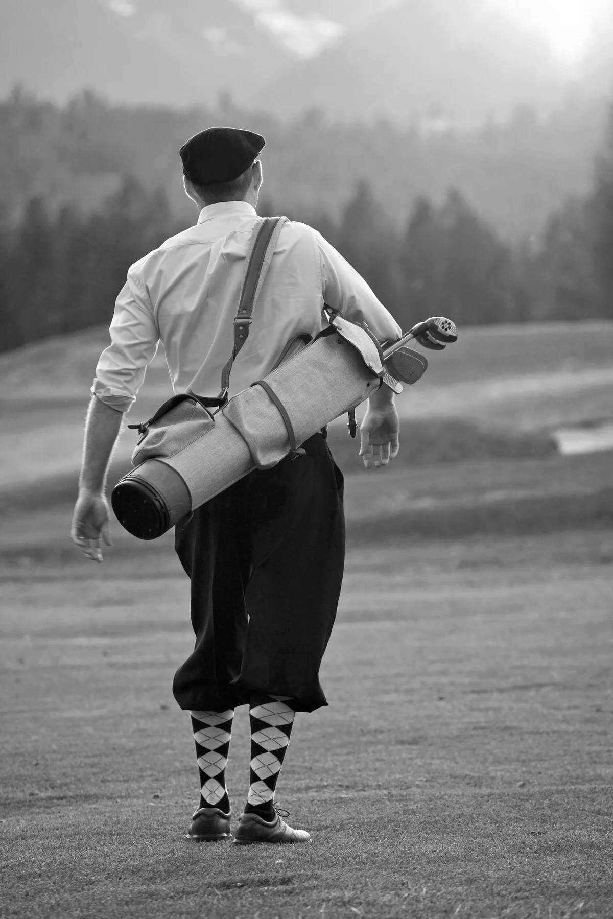 Stylish Vintage Golfer with Golf bag and golf equipment