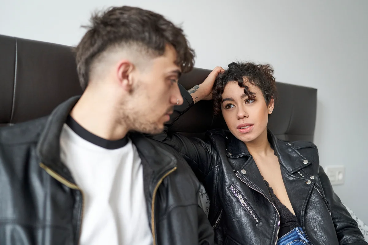Couple having a serious talk on the couch