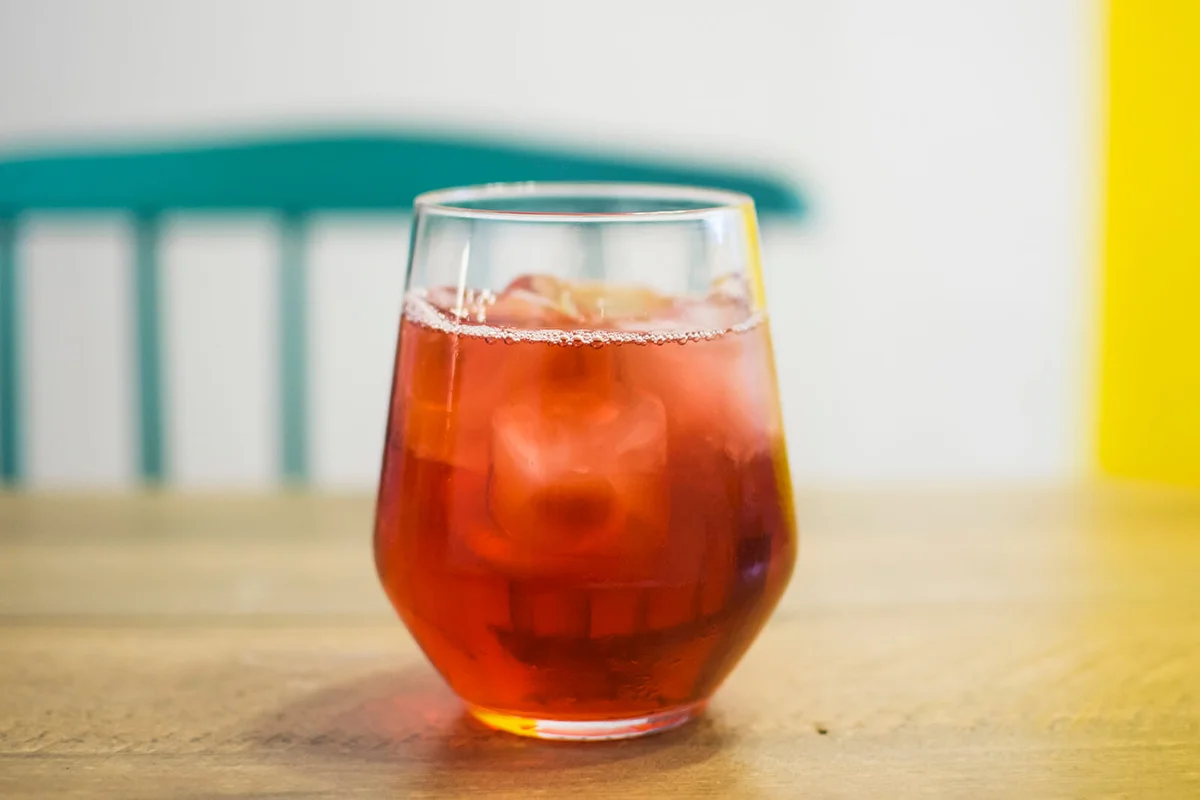 Sangria served with ice in a tumbler glass