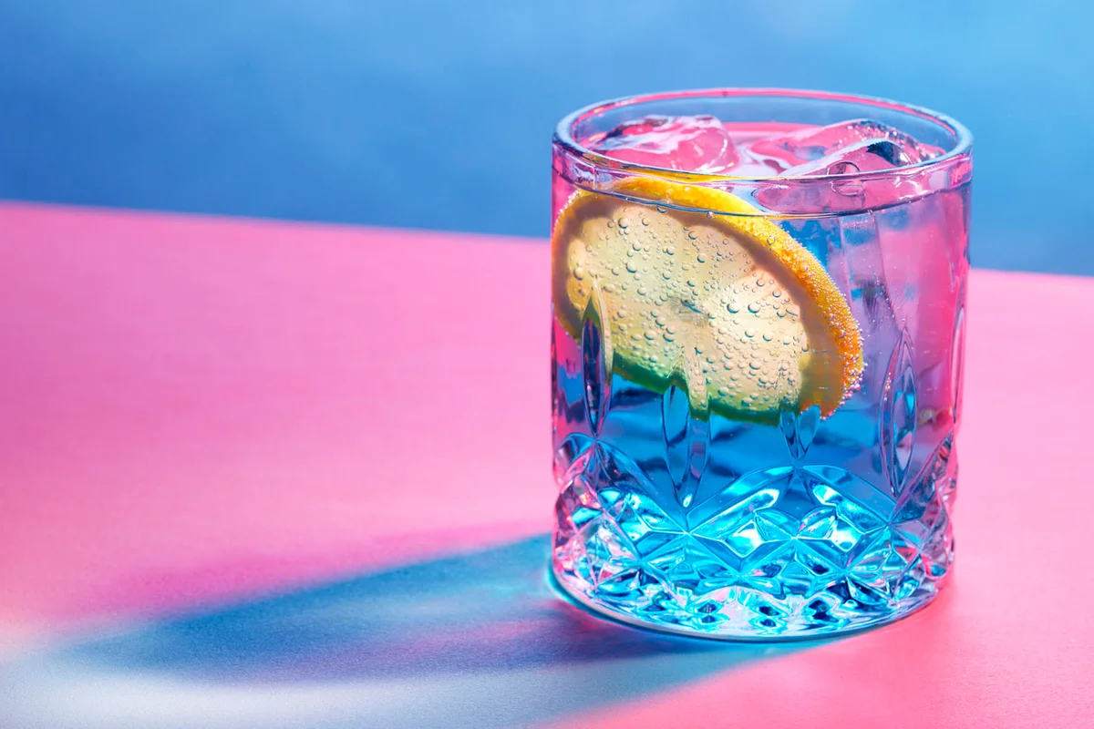 Blue drink with a slice of lemon