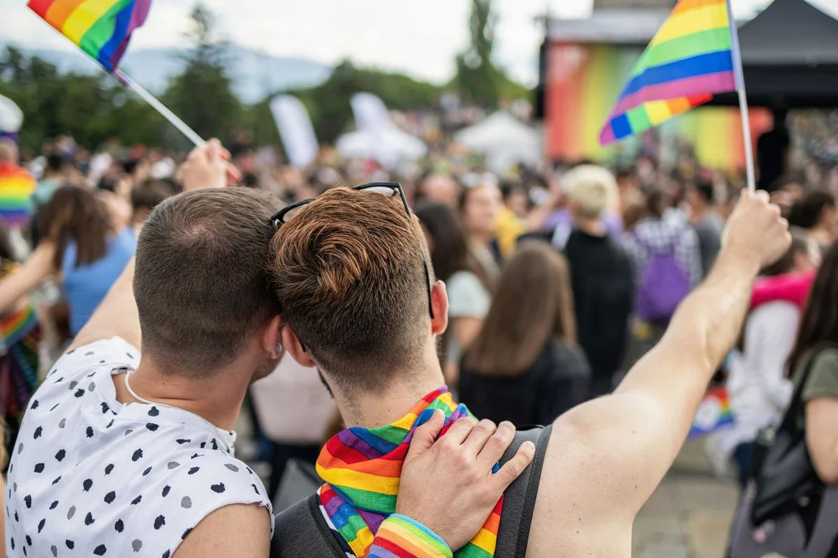 Young gay men partying at the annual LGBTQIA parade