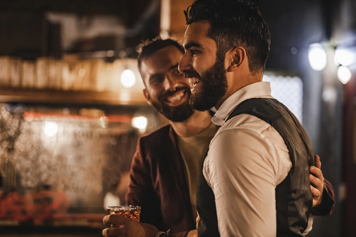 grooms toasting at wedding