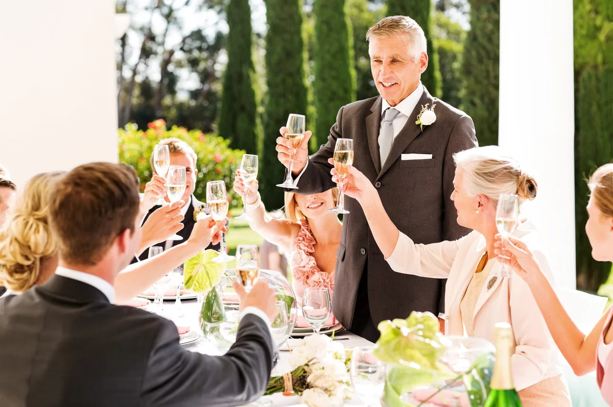 parents toasting at wedding