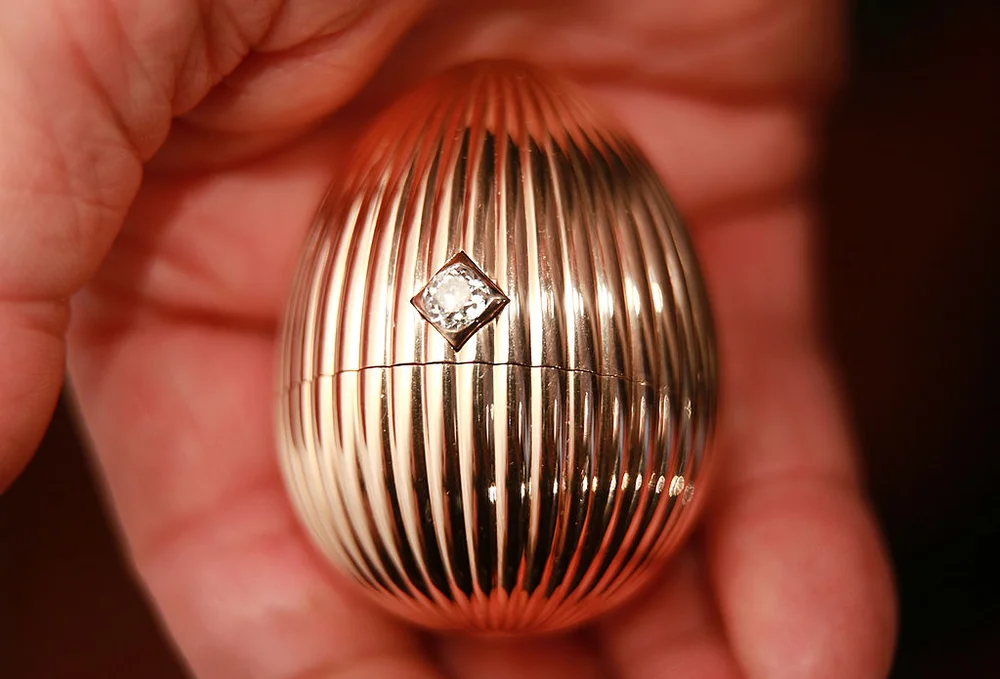 LONDON, ENGLAND - APRIL 16: The Third Faberge Imperial Easter Egg is displayed at Court Jewellers Wartski on April 16, 2014 in London, England. This rare Imperial Faberge Easter Egg, made for the Russian Royal family in 1887, thought to be worth tens of millions of dollar, was seized by the Bolsheviks after the Russian revolution. It was sold at auction in New York in 1964 as a 'Gold watch in egg form case' for $2450 - its provenance then unknown. Later a buyer in the US Mid-West bought it for possible scrap metal value until he discovered it's true value.