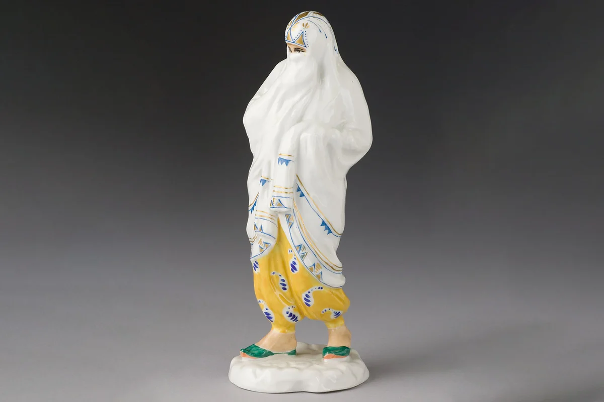 A RUSSIAN PORCELAIN MIDDLE EASTERN WOMAN. Lomonosov Porcelain Factory, 20th Century